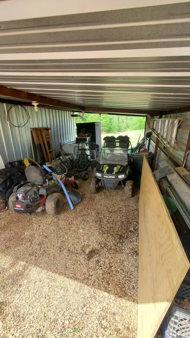 Shop equipment staged for removal.